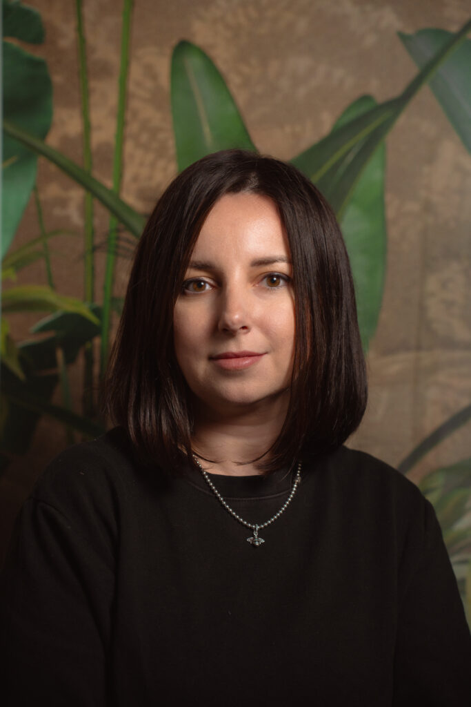 Professional portrait of a permanent makeup and fine line tattoo artist based in Apex, North Carolina — serving clients from Raleigh, Durham, and Morrisville NC.